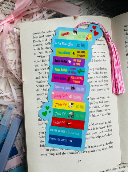 blue Die-cut bookmark featuring a bookstack inspired by Tessa Bailey’s romance novels, ideal for fans of her passionate, steamy love stories.