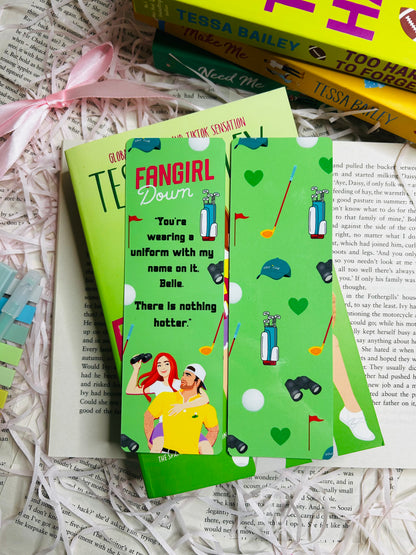 Green 'Fan Girl Down' inspired bookmark, perfect for fans of Tessa Bailey’s steamy romances and swoon-worthy characters, with golf ball, caddy, hat and binoculars printed on it.