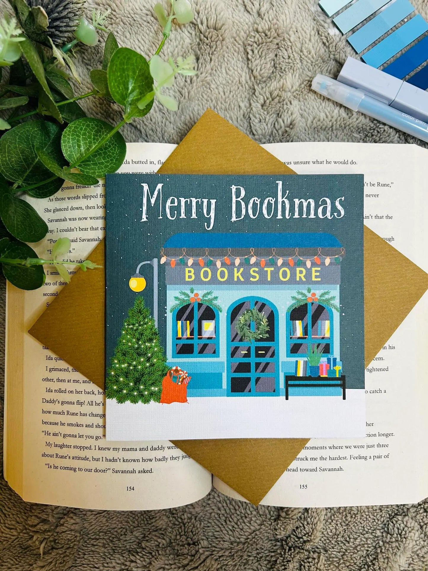 Cosy bookish bookstore Christmas card, festive holiday card for book lovers and readers, perfect literary Christmas gift.